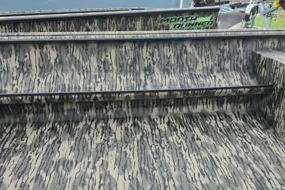 Slide: The Image of Camouflage interior of 2027 Havoc 1656 MRST MACH 1 boat, showcasing rugged design. - 7