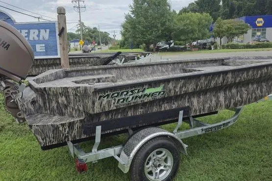The Image of 2027 Havoc 1656 MRST MACH 1 Marsh Runner boat on trailer, camo design. - 0