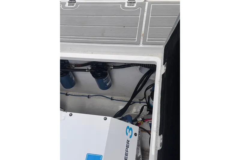Slide: The Image of Engine compartment of 2023 Sea Fox 368 Commander boat, showcasing mechanical components. - 49