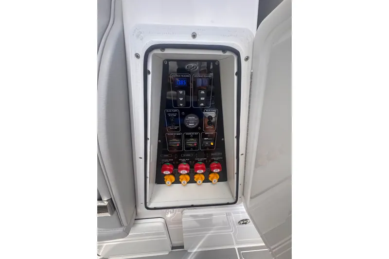 Slide: The Image of Control panel of 2023 Sea Fox 368 Commander boat, featuring switches and voltage display. - 40