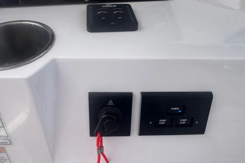 Slide: The Image of Control panel of 2023 Sea Fox 368 Commander boat with power switches. - 14