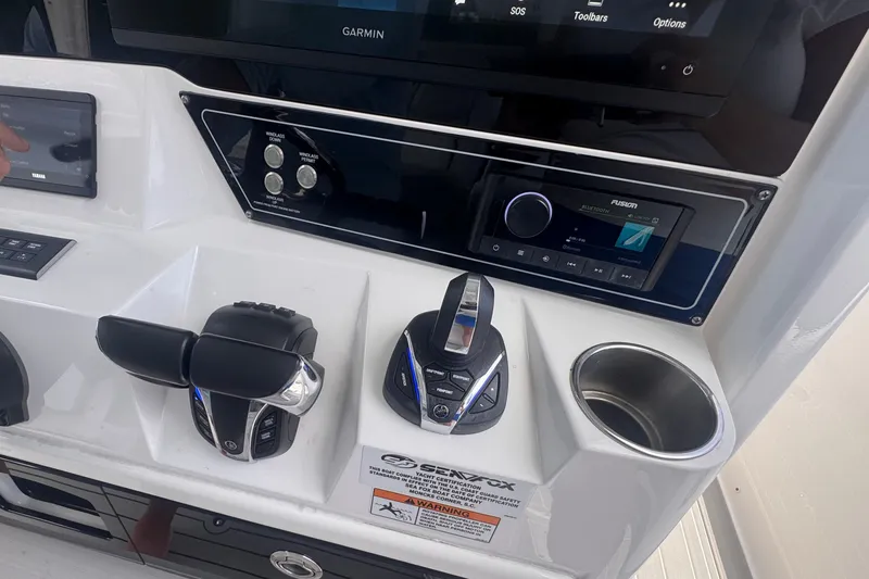 Slide: The Image of Control panel of 2023 Sea Fox 368 Commander boat with advanced navigation and audio systems. - 12