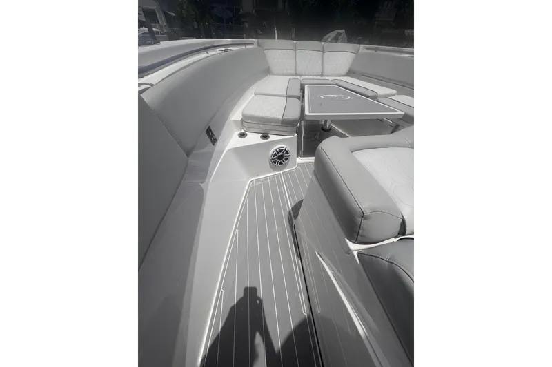 Slide: The Image of 2023 Sea Fox 368 Commander boat interior with cushioned seating and table. - 45