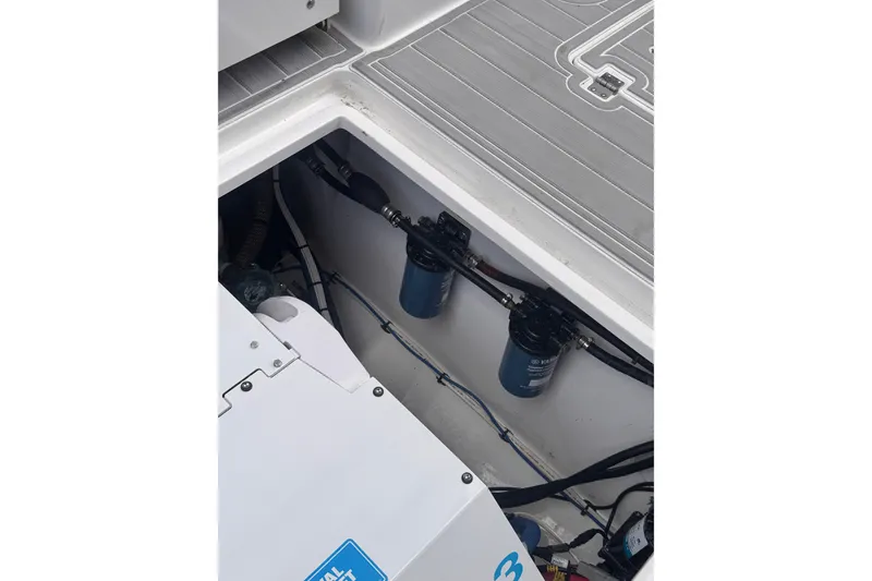 Slide: The Image of Engine compartment of 2023 Sea Fox 368 Commander with visible fuel filters and wiring. - 50