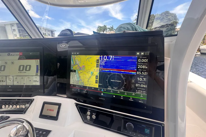 Slide: The Image of Dashboard of 2023 Sea Fox 368 Commander with Garmin navigation displays. - 8