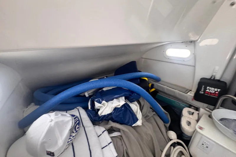 Slide: The Image of Interior storage area of 2023 Sea Fox 368 Commander with various boating supplies. - 24