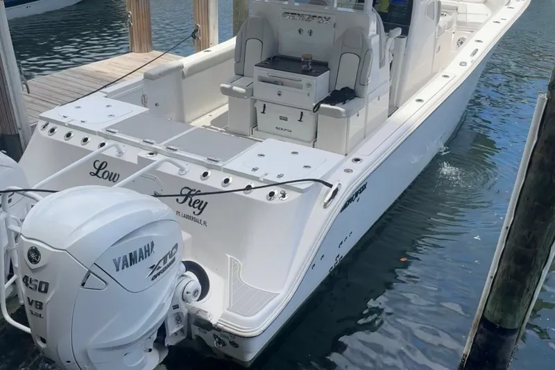 Slide: The Image of 2023 Sea Fox 368 Commander boat docked with Yamaha 450 engines. - 3