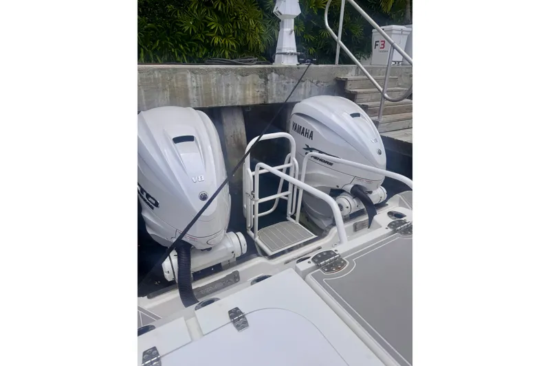 Slide: The Image of 2023 Sea Fox 368 Commander with twin Yamaha V8 outboard engines docked. - 54