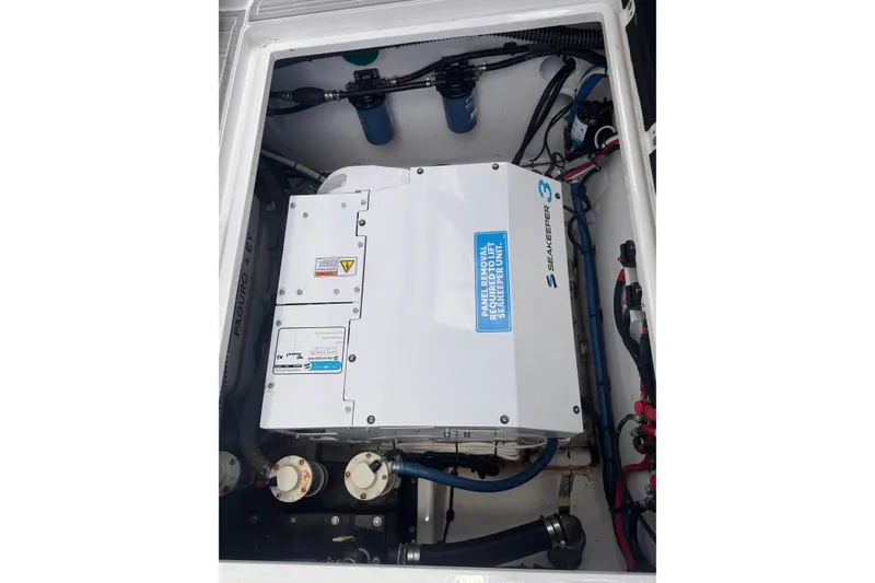 Slide: The Image of Engine compartment of 2023 Sea Fox 368 Commander with Seakeeper 3 stabilizer unit. - 47