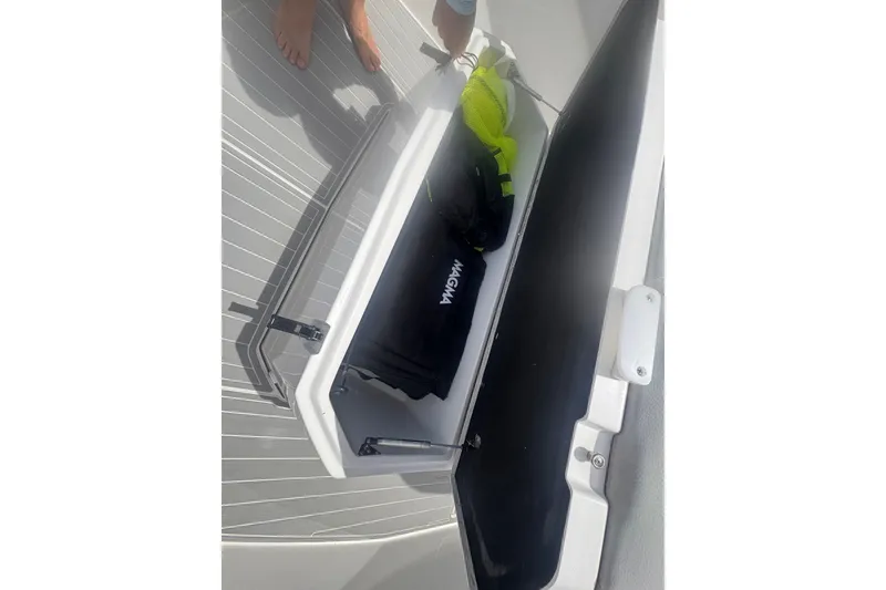 Slide: The Image of Open storage compartment on 2023 Sea Fox 368 Commander boat deck. - 39