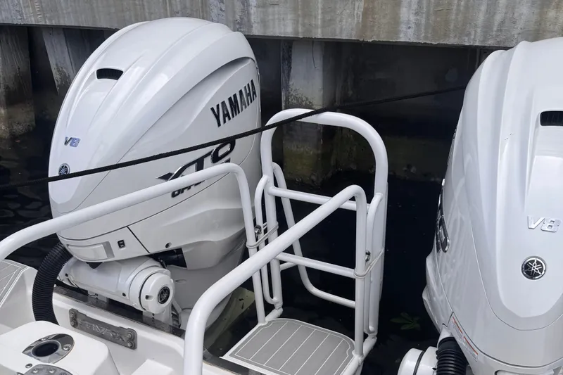 Slide: The Image of 2023 Sea Fox 368 Commander with twin Yamaha V8 outboard engines docked. - 53