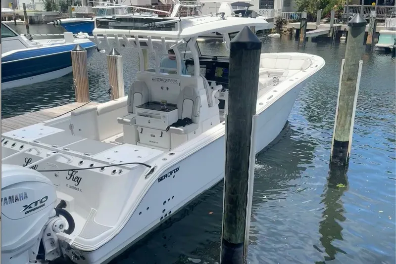 The Image of 2023 Sea Fox 368 Commander docked in a marina, rear view. - 0