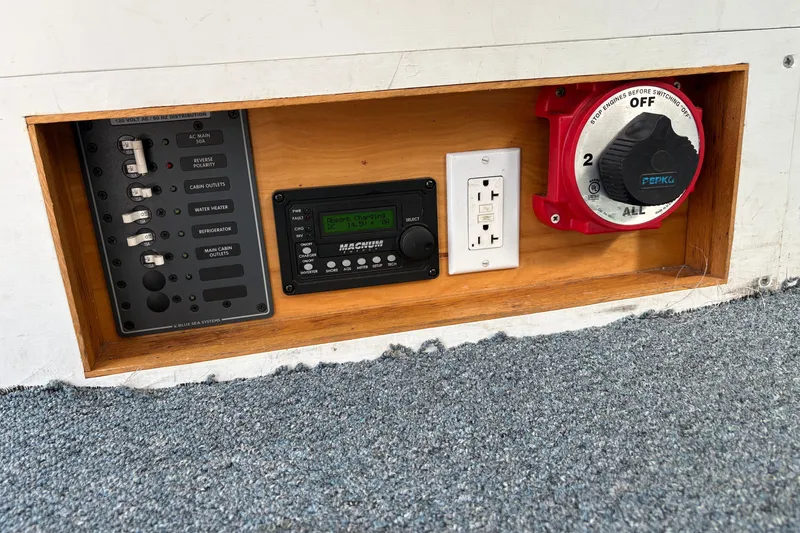 Slide: The Image of Electrical panel and controls on a 1978 Mainship 34 Trawler boat. - 23