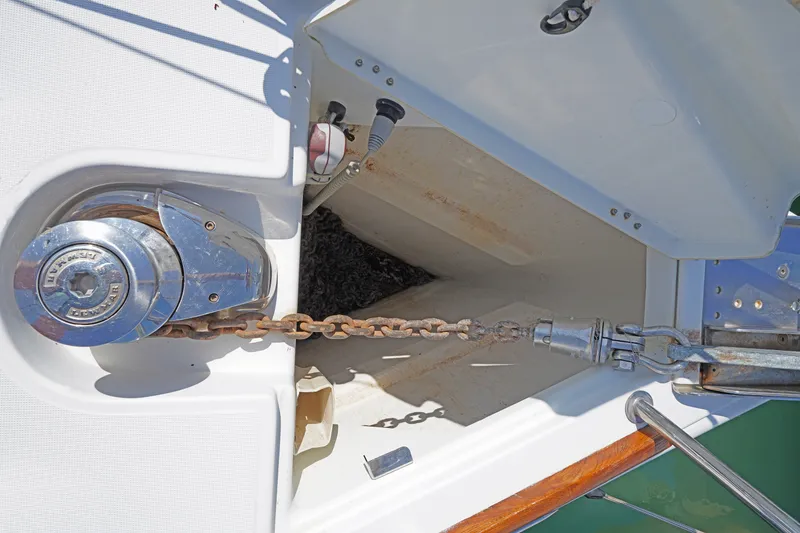 Slide: The Image of Anchor chain and windlass on 2011 Jeanneau Sun Odyssey 50 DS sailboat. - 8
