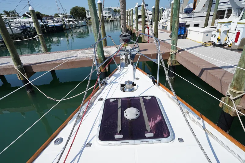 Slide: The Image of Jeanneau Sun Odyssey 50 DS 2011 docked at marina, showcasing deck and rigging. - 6