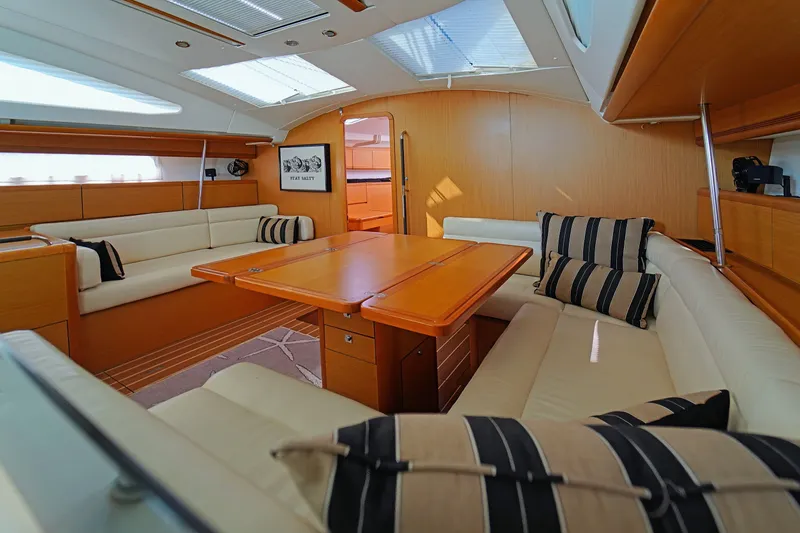 Slide: The Image of Luxurious interior of 2011 Jeanneau Sun Odyssey 50 DS yacht with elegant seating and table. - 20