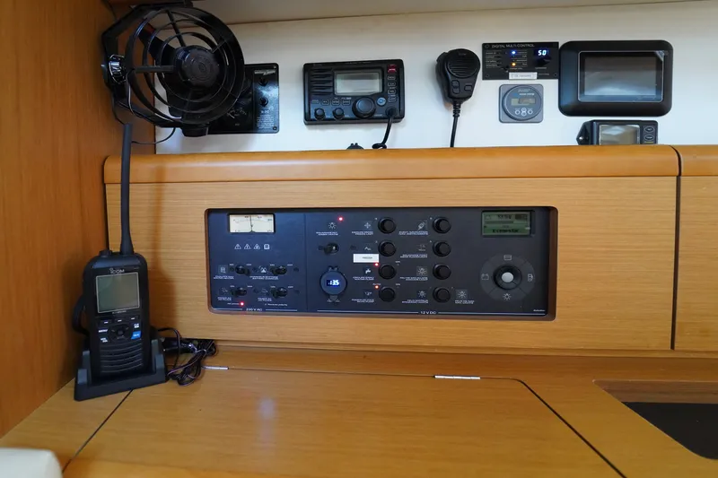 Slide: The Image of Control panel of a 2011 Jeanneau Sun Odyssey 50 DS sailboat with navigation equipment. - 27
