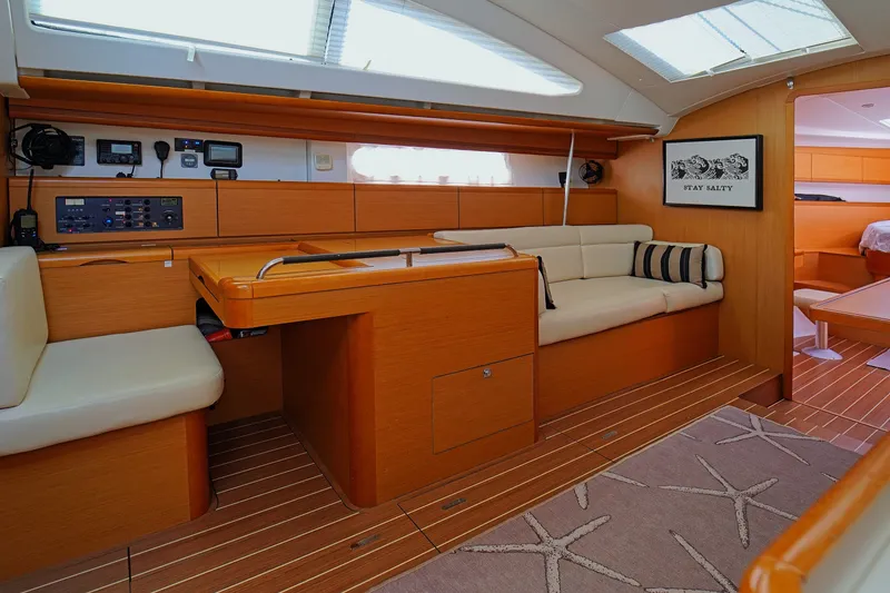 Slide: The Image of Luxurious interior of 2011 Jeanneau Sun Odyssey 50 DS yacht with elegant wood finish. - 22