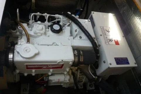 Slide: The Image of Engine compartment of 2011 Jeanneau Sun Odyssey 50 DS yacht, featuring a Northern Lights generator. - 37