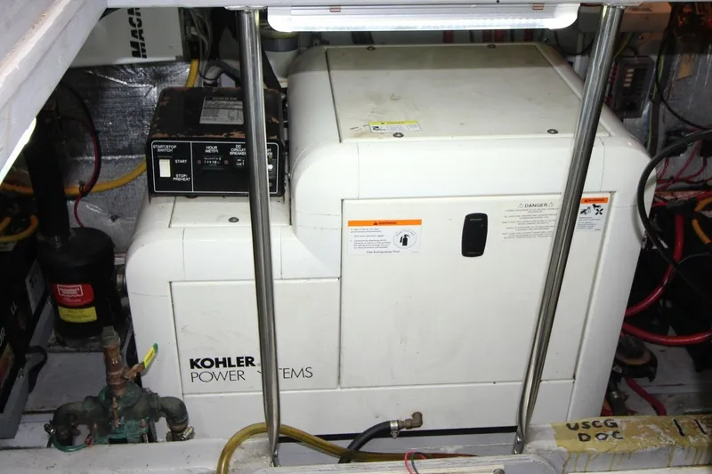 Slide: The Image of Kohler power system in 2004 Silverton 410 Sport Bridge engine room. - 33