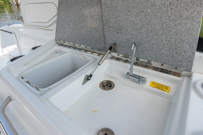 Slide: The Image of 2008 Formula 310 Bowrider boat sink and faucet detail. - 34