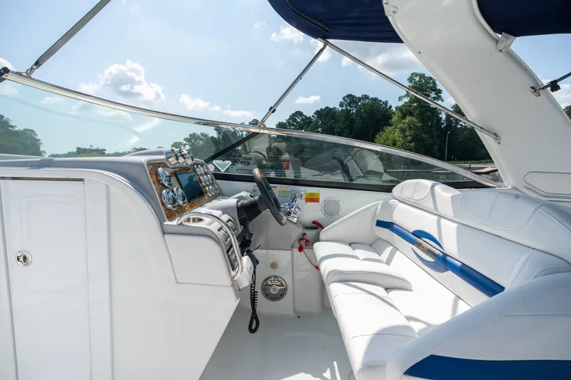Slide: The Image of 2008 Formula 310 Bowrider interior with white seating and modern dashboard controls. - 31
