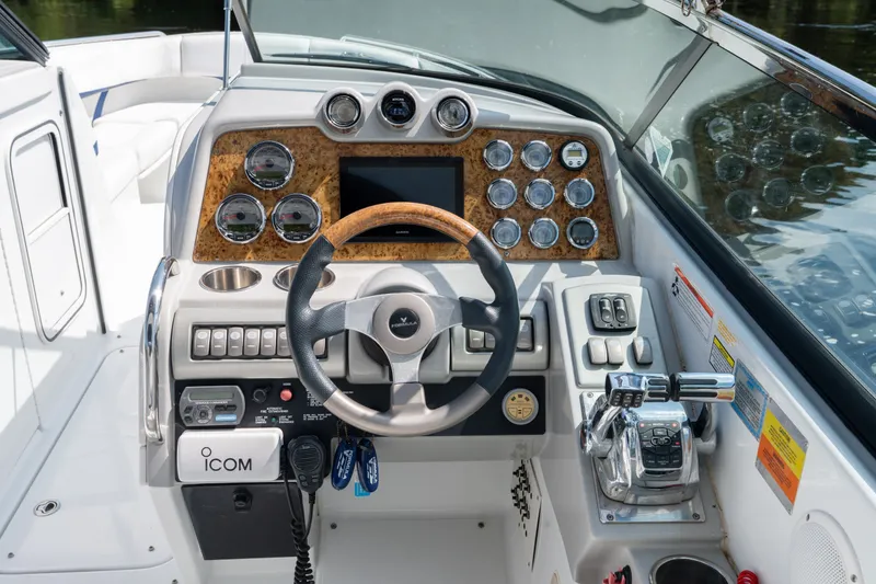 Slide: The Image of Cockpit of 2008 Formula 310 Bowrider with steering wheel, gauges, and controls. - 29