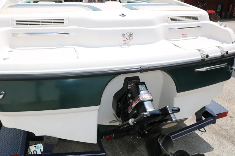 Slide: The Image of 1997 Chaparral 2130 SS boat rear view with outboard motor on trailer. - 47