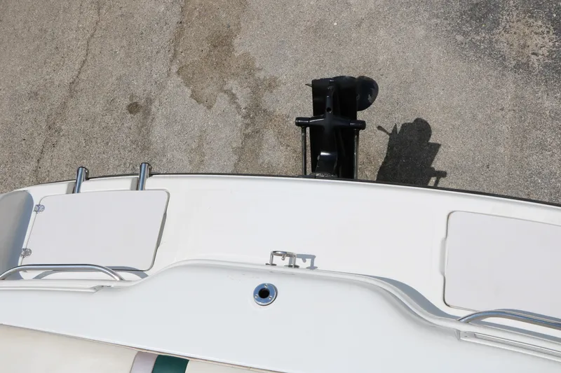 Slide: The Image of 1997 Chaparral 2130 SS boat stern view with ladder and motor mount. - 24