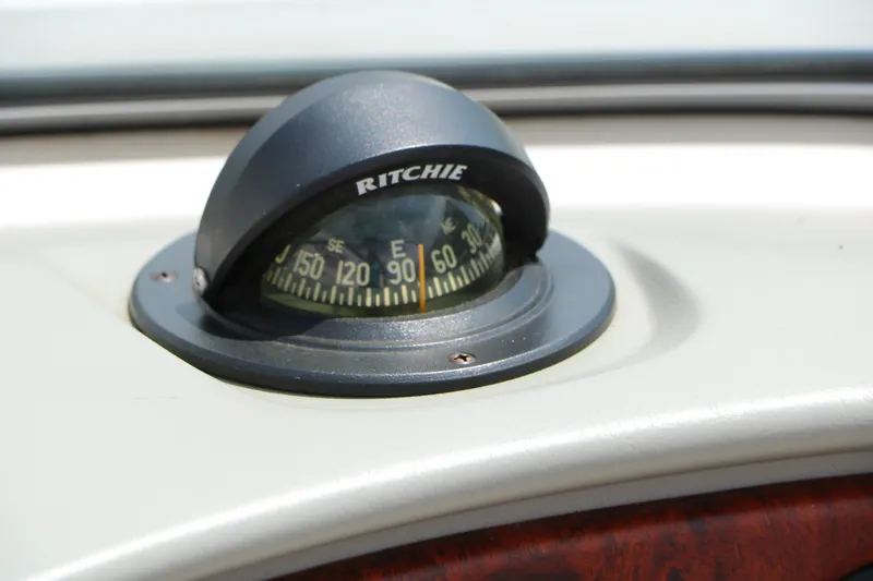 Slide: The Image of Ritchie compass on 1997 Chaparral 2130 SS boat dashboard. - 43