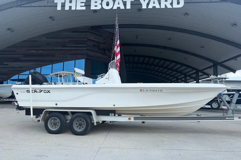 Slide: The Image of 2004 Sea Fox 225 Bay Fisher boat on trailer at The Boat Yard. - 2