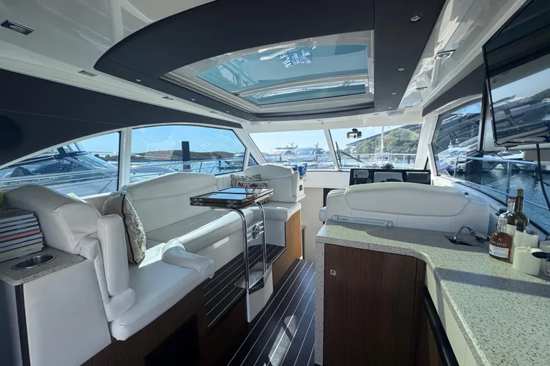 Slide: The Image of Luxurious interior of 2012 Cruisers Yachts 41 Cantius with panoramic windows and modern amenities. - 15
