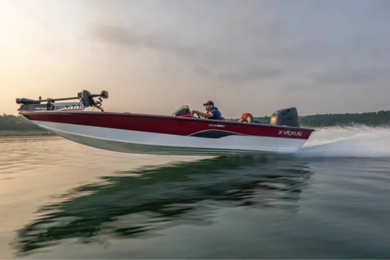 The Image of 2027 Vexus AVX1880C boat speeding on a calm lake at sunset. - 1