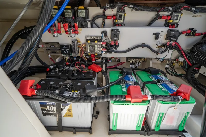 Slide: The Image of Electrical system of 2025 Sea Ray Sundancer 320 Outboard with batteries and wiring. - 28