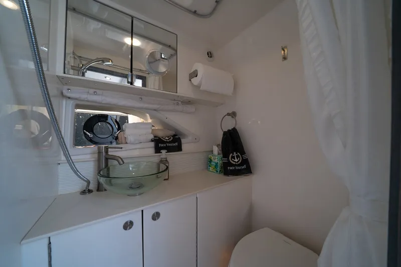 Slide: The Image of Luxurious bathroom in 2025 Sea Ray Sundancer 320 Outboard yacht with modern amenities. - 25