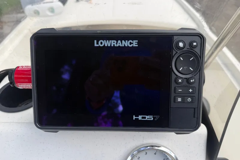 Slide: The Image of Lowrance HDS7 fishfinder on 2016 Mako Pro Skiff 16 CC boat dashboard. - 16