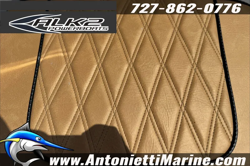 Slide: The Image of Quilted leather detail on ALK2 Powerboats 17HS, 2027 model, with contact information. - 13