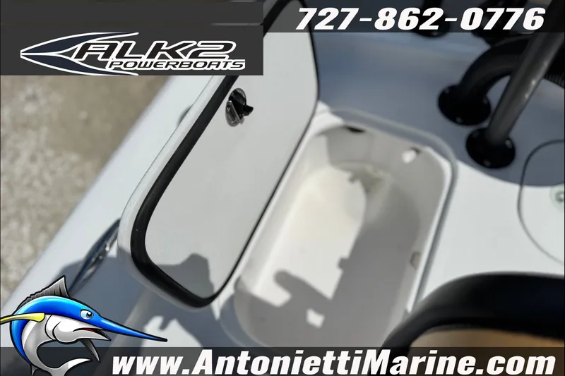 Slide: The Image of Open storage compartment on 2027 ALK2 Powerboats 17HS, featuring logo and contact details. - 15