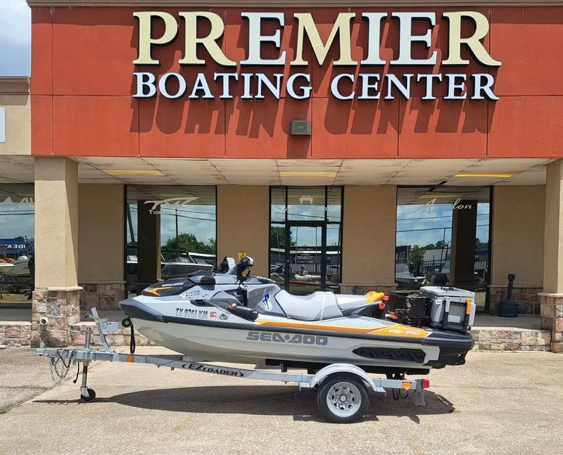 The Image of A 2022 Sea-Doo FISH PRO TROPHY 170 on a trailer outside a boating center. - 1