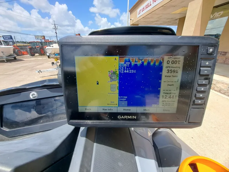 Slide: The Image of A Garmin navigation system on a 2022 Sea-Doo FISH PRO TROPHY 170 displays a map. - 16