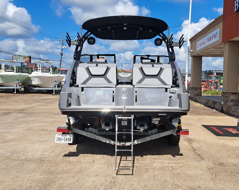 Slide: The Image of The image shows a 2025 Yamaha 222XD boat on a trailer, ready for launch. - 10