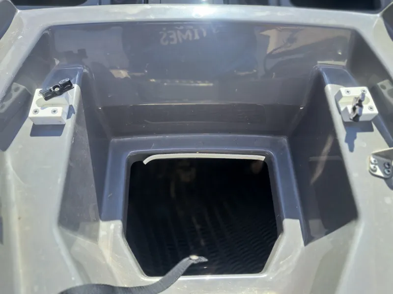 Slide: The Image of Close-up of a storage compartment on a Yamaha 222XD boat. - 15