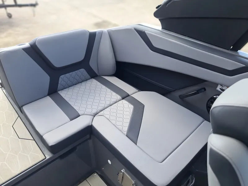 Slide: The Image of The 2025 Yamaha 222XD features modern gray upholstery with a geometric pattern in the seating area. - 25