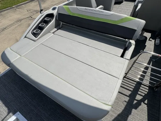 Slide: The Image of The image shows a gray lounging area on a 2022 Bennington 22 SSBX boat. - 17