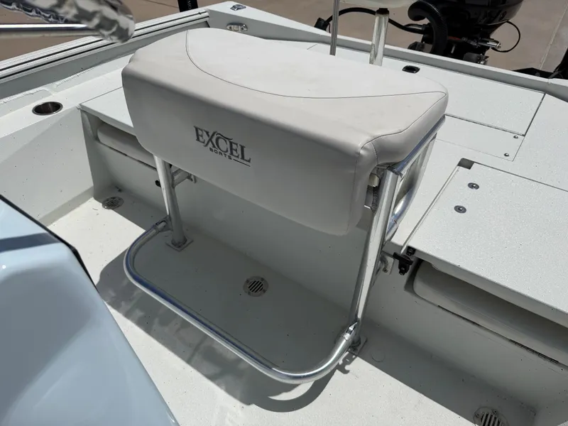 Slide: The Image of Bench seat on a 2023 Excel 203 Bay Pro boat with stainless steel frame. - 26