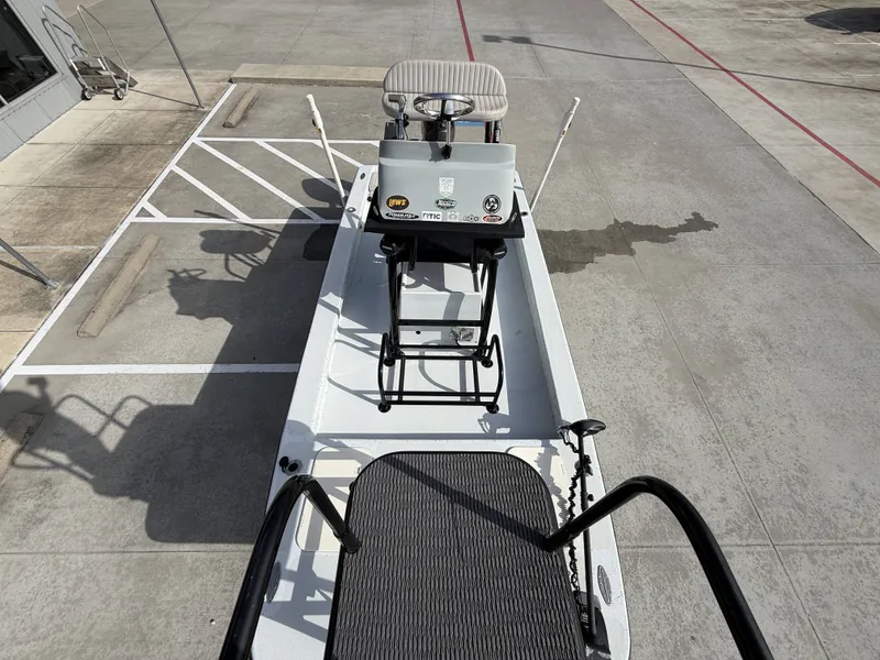 Slide: The Image of A 2016 Exuma 17 Island Skiff is parked on a lot. It features a simple, functional design. - 23