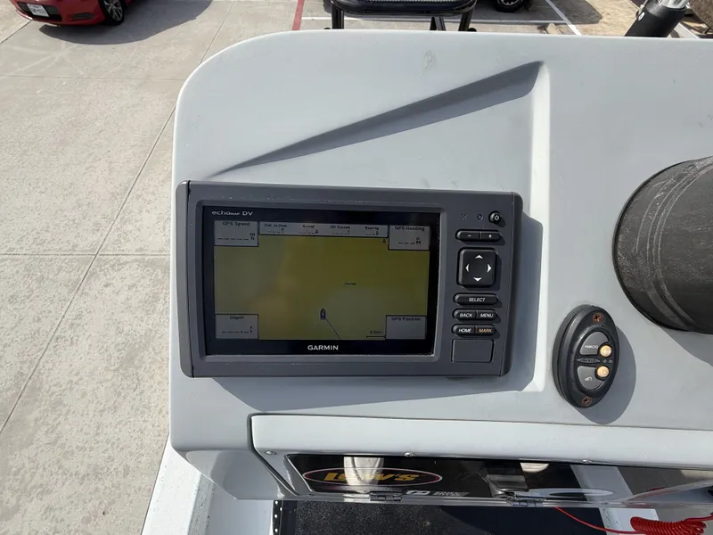 Slide: The Image of A Garmin fishfinder is mounted on the helm of a 2016 Exuma 17 Island Skiff. - 20