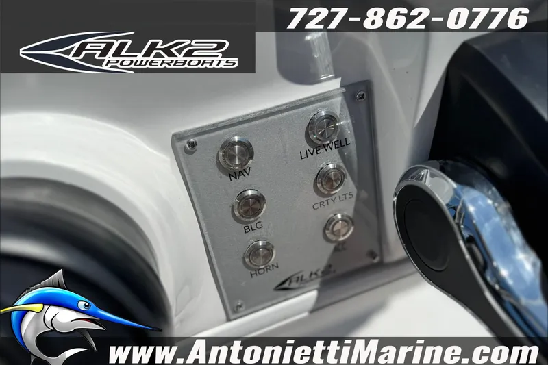 Slide: The Image of Control panel of 2027 ALK2 Powerboats 17HS with navigation and livewell buttons. - 13