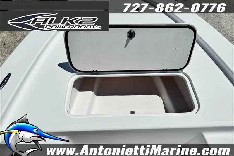 Slide: The Image of Open storage compartment on 2027 ALK2 Powerboats 17HS, featuring logo and contact details. - 9