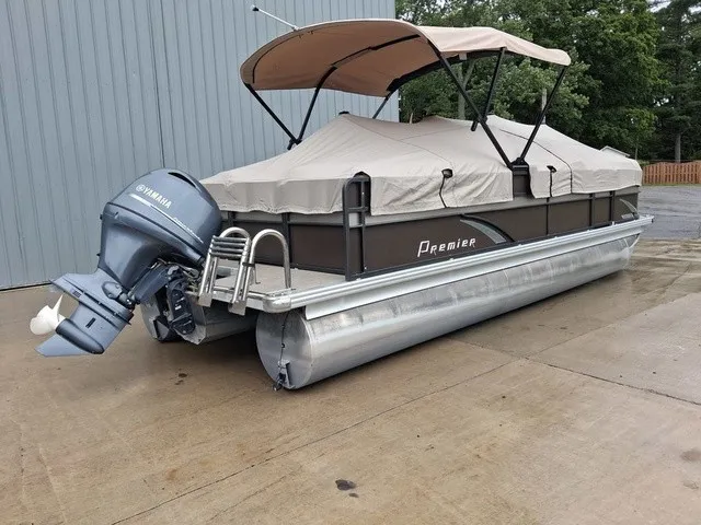 Slide: The Image of A 2015 Premier Sunsation RF 230 pontoon boat with a Yamaha outboard motor. - 20